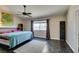 Large primary bedroom with ceiling fan, lots of light, and adjoining primary bathroom at 3816 Sunking St, Las Vegas, NV 89130