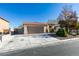 Single-story home with tile roof, two car garage, and low maintenance desert landscaping at 3816 Sunking St, Las Vegas, NV 89130