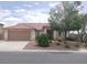 Inviting single-story home showcasing a tile roof, attached garage and manicured landscaping in a desirable neighborhood at 3816 Sunking St, Las Vegas, NV 89130