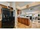 Stylish kitchen with custom cabinets, granite counters, and modern stainless steel appliances at 3816 Sunking St, Las Vegas, NV 89130