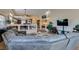 Open-concept living room showcasing a comfortable sofa and seamless flow to the kitchen at 3816 Sunking St, Las Vegas, NV 89130