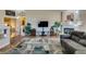Cozy living room featuring a fireplace, tiled floors, and comfortable seating at 3816 Sunking St, Las Vegas, NV 89130