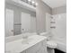 Bathroom with sink, mirror, and toilet with a shower and tub combo at 4339 Spencer St # 15, Las Vegas, NV 89119