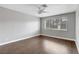 Bedroom featuring hardwood floors and a window at 4339 Spencer St # 15, Las Vegas, NV 89119