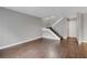 Spacious living room with hardwood floors and staircase at 4339 Spencer St # 15, Las Vegas, NV 89119