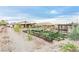 Expansive backyard with multiple raised garden beds and established landscaping offers a serene outdoor living experience at 5741 N Park St, Las Vegas, NV 89149