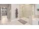 Elegant bathroom with a glass-enclosed shower and a luxurious soaking tub at 5741 N Park St, Las Vegas, NV 89149