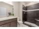 Modern bathroom highlighting a sleek vanity and contemporary walk-in shower at 5741 N Park St, Las Vegas, NV 89149