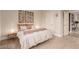 Comfortable bedroom with stylish decor, wood floors, and abundant natural light at 5741 N Park St, Las Vegas, NV 89149