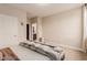Serene bedroom featuring wood floors, ensuite bathroom, and soft natural lighting at 5741 N Park St, Las Vegas, NV 89149