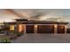 Beautiful single-story home with stone accents, three-car garage, and desert landscaping at 5741 N Park St, Las Vegas, NV 89149
