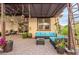 Stylish outdoor patio with comfortable seating and beautiful landscaping creates a relaxing entertainment space at 5741 N Park St, Las Vegas, NV 89149