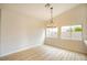 Dining Room featuring light wood floors, an eat-in kitchen, and natural light at 6124 Desert Haven Rd, Las Vegas, NV 89130