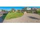 Lush community park featuring well-maintained lawns, gravel paths, and native landscaping, a serene outdoor space at 6442 Kobe Knoll Ct, Las Vegas, NV 89141