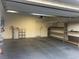 An organized two-car garage with built-in shelving, offering practical storage solutions and a clean, spacious area at 6442 Kobe Knoll Ct, Las Vegas, NV 89141