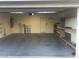 Spacious two-car garage with ample storage shelving and a clean, organized layout at 6442 Kobe Knoll Ct, Las Vegas, NV 89141
