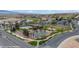 Aerial shot showing community amenities including tennis courts, pool, and green spaces at 653 Paloma Cir, Mesquite, NV 89027