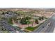 Overhead shot of community amenities: pool, tennis courts, and landscaped areas, offering a snapshot of leisure at 653 Paloma Cir, Mesquite, NV 89027
