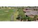 Beautiful aerial view highlighting the home's location near a lush golf course at 653 Paloma Cir, Mesquite, NV 89027