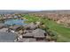 Gorgeous aerial view highlighting the home's location near a lake and golf course at 653 Paloma Cir, Mesquite, NV 89027