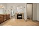 Bright primary bathroom with fireplace, dual sinks, and separate toilet room at 653 Paloma Cir, Mesquite, NV 89027