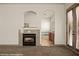 Bathroom view featuring a fireplace, doorway to a bathtub, and access to the outdoors at 653 Paloma Cir, Mesquite, NV 89027