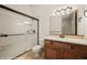 Bathroom with glass enclosed shower and modern vanity at 653 Paloma Cir, Mesquite, NV 89027