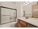 Bathroom with a glass shower door, a light wood vanity, and a white countertop at 653 Paloma Cir, Mesquite, NV 89027