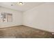 Spacious bedroom featuring a plush carpet, neutral walls, and a window for natural light at 653 Paloma Cir, Mesquite, NV 89027