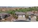 Attractive home featuring a well-manicured front yard and a circular driveway at 653 Paloma Cir, Mesquite, NV 89027