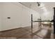 Garage featuring a car lift and epoxy flooring at 653 Paloma Cir, Mesquite, NV 89027