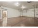 Spacious garage with epoxy flooring and a door to the house at 653 Paloma Cir, Mesquite, NV 89027