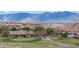 Scenic view of golf course and mountain range at 653 Paloma Cir, Mesquite, NV 89027