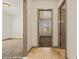 Hallway with tile flooring and access to multiple rooms at 653 Paloma Cir, Mesquite, NV 89027