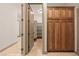 Hallway with access to a pantry with shelving at 653 Paloma Cir, Mesquite, NV 89027