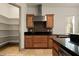 Modern kitchen with stainless steel appliances, granite countertops and custom cabinetry at 653 Paloma Cir, Mesquite, NV 89027