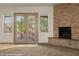 Close up on a fireplace and double doors leading to the outside at 653 Paloma Cir, Mesquite, NV 89027