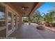Extended covered patio with ceiling fans and golf course views at 653 Paloma Cir, Mesquite, NV 89027
