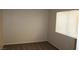 Bedroom featuring neutral walls, carpet flooring and a window for ample natural light at 7570 Durham Hall Ave # 101, Las Vegas, NV 89130