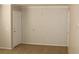 A bright living area features tile floors and neutral walls at 7570 Durham Hall Ave # 101, Las Vegas, NV 89130