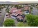 Aerial view showcases tile roof, solar panels, pristine landscaping, and private pool at 8104 Wispy Sage Way, Las Vegas, NV 89149