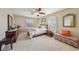 Comfortable bedroom with shuttered windows, warm lighting, and classic furnishings at 8104 Wispy Sage Way, Las Vegas, NV 89149