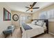 Well-lit bedroom with a queen bed and stylish furnishings; complemented by soft, neutral tones at 8104 Wispy Sage Way, Las Vegas, NV 89149