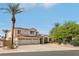 Charming two-story home with a well-manicured front yard, tile roof, and three-car garage at 8104 Wispy Sage Way, Las Vegas, NV 89149
