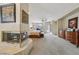 Open main bedroom has fireplace, furnishings and a neutral color palette at 8104 Wispy Sage Way, Las Vegas, NV 89149