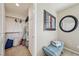 Spacious walk-in closet with ample storage and a seating area for dressing at 8104 Wispy Sage Way, Las Vegas, NV 89149