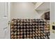 Convenient wine storage area with racks filled with a variety of wine bottles at 8104 Wispy Sage Way, Las Vegas, NV 89149