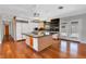 Spacious kitchen with a large island, stainless steel appliances, and modern lighting at 819 Bracken Ave, Las Vegas, NV 89104