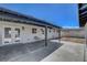 Covered back patio with a concrete floor and an open yard space at 819 Bracken Ave, Las Vegas, NV 89104