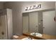 Clean bathroom with essential fixtures and a large mirror at 8250 N Grand Canyon Dr # 2029, Las Vegas, NV 89166
